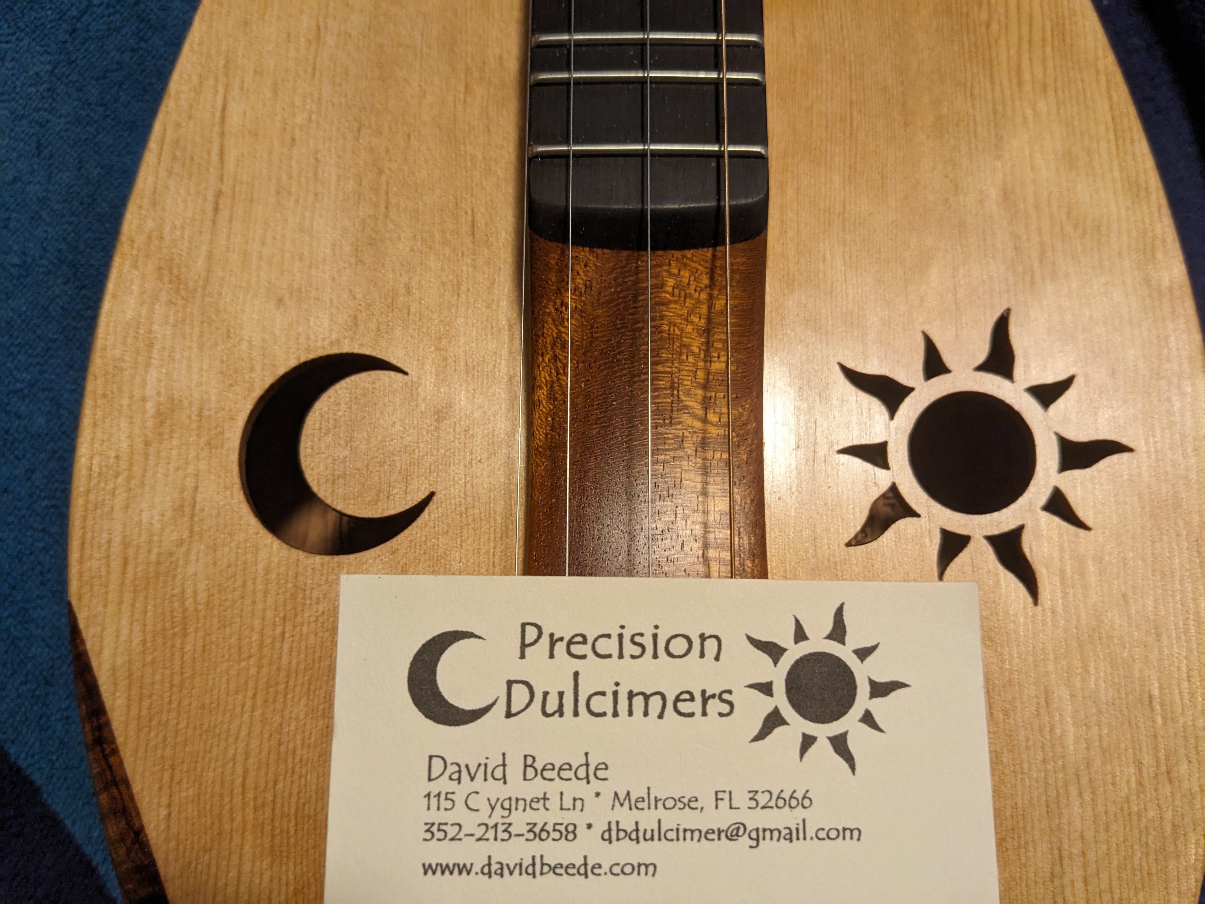 David's Biz card on top of dulci